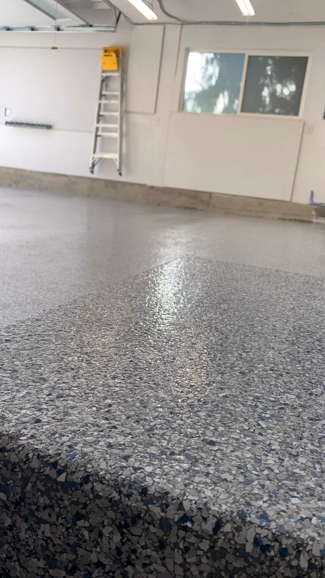 Tidal Wave Evolution epoxy flake floor by Cascade Concrete Coatings
