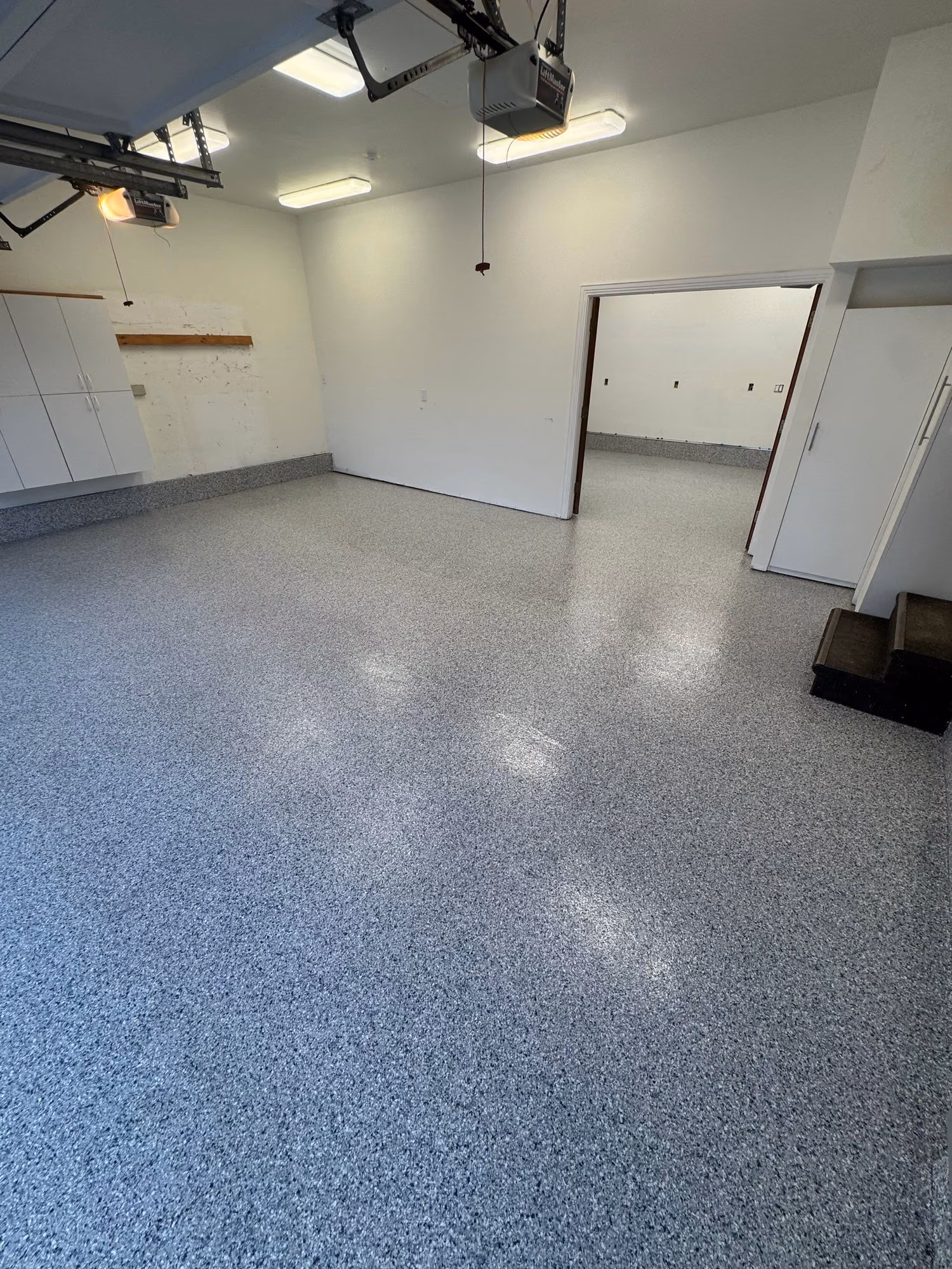 Tidal Wave Evolution epoxy flake floor by Cascade Concrete Coatings