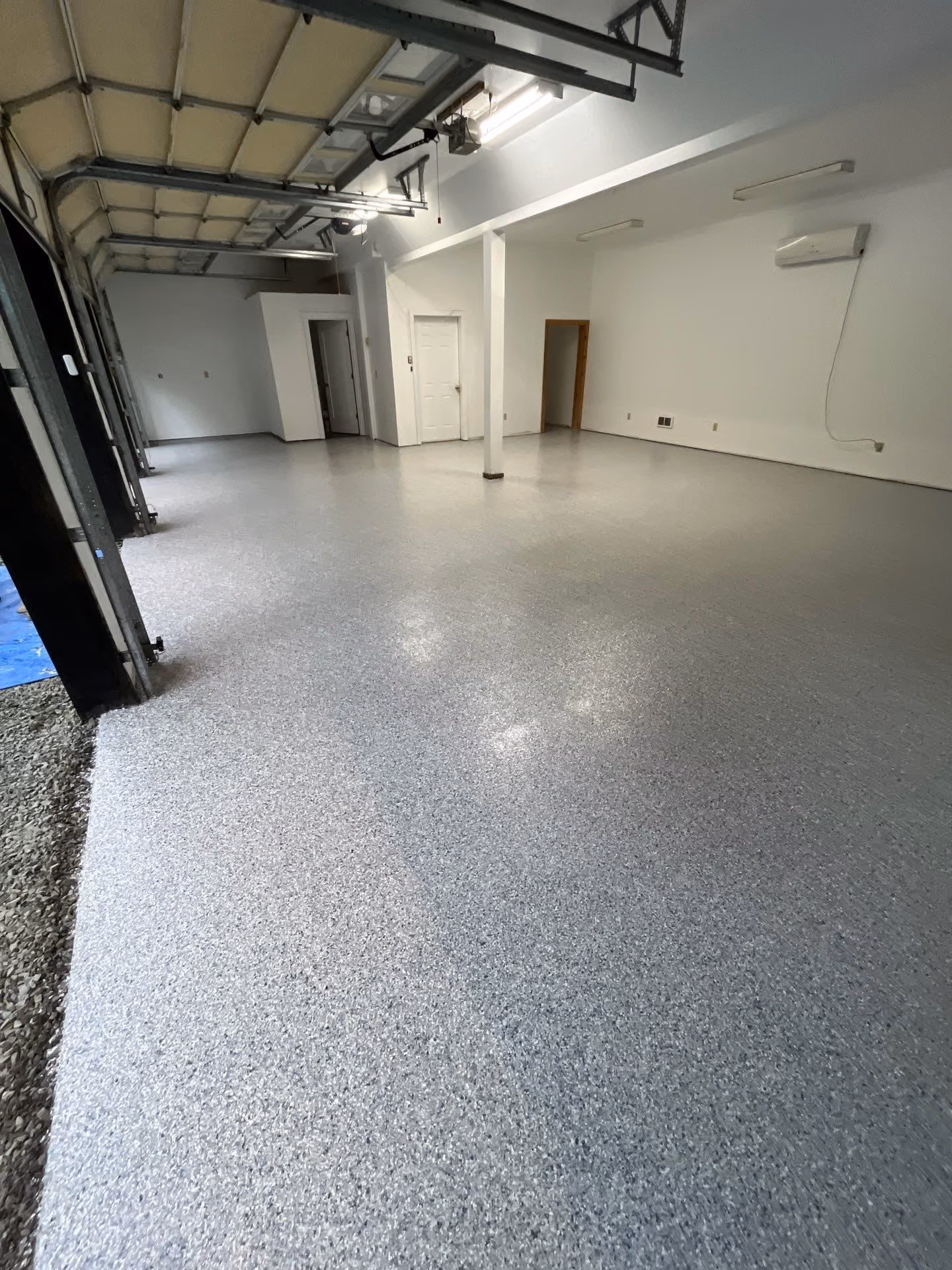 Tidal Wave Evolution epoxy flake floor by Cascade Concrete Coatings
