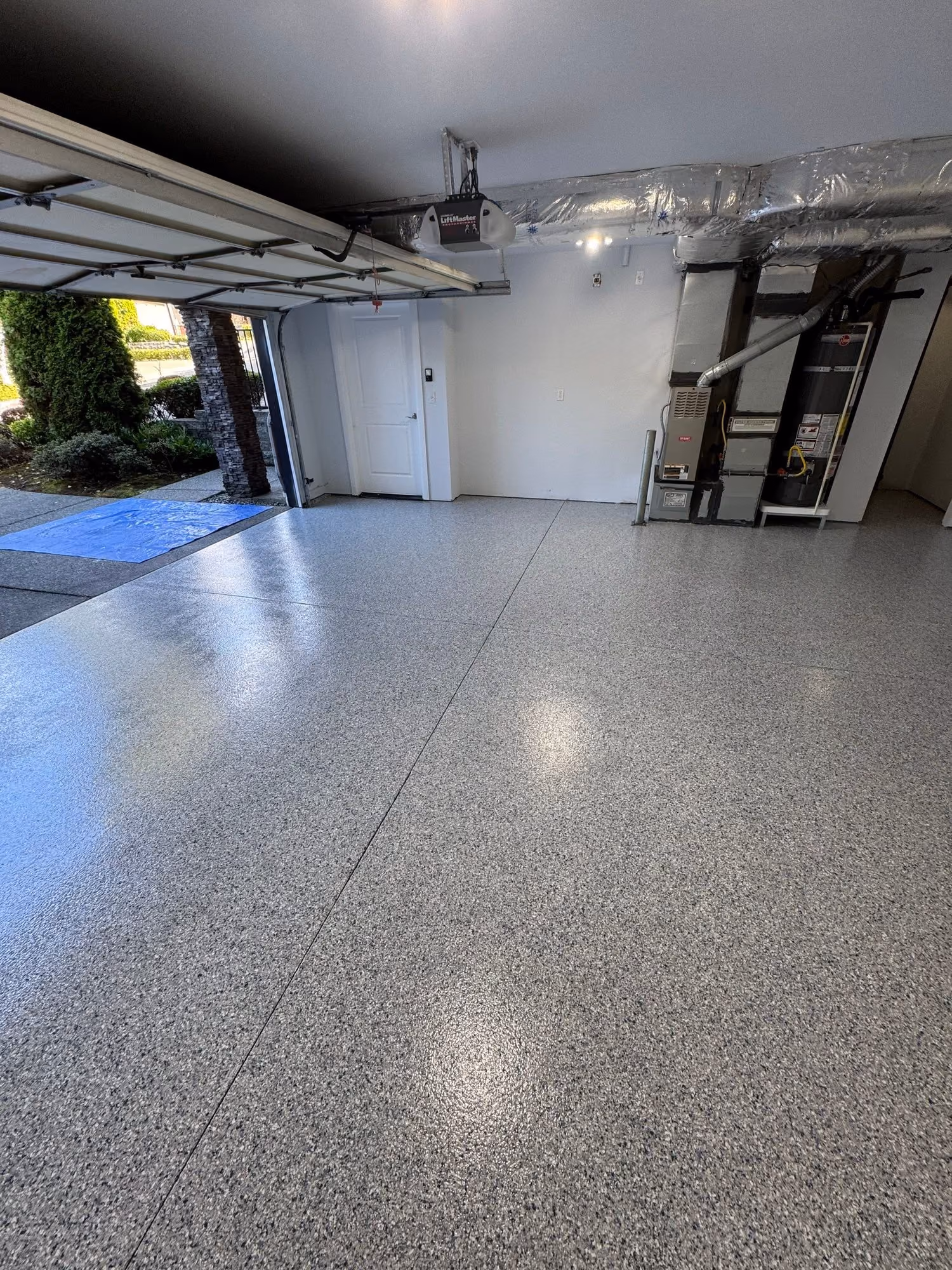 Tidal Wave Evolution epoxy flake floor by Cascade Concrete Coatings
