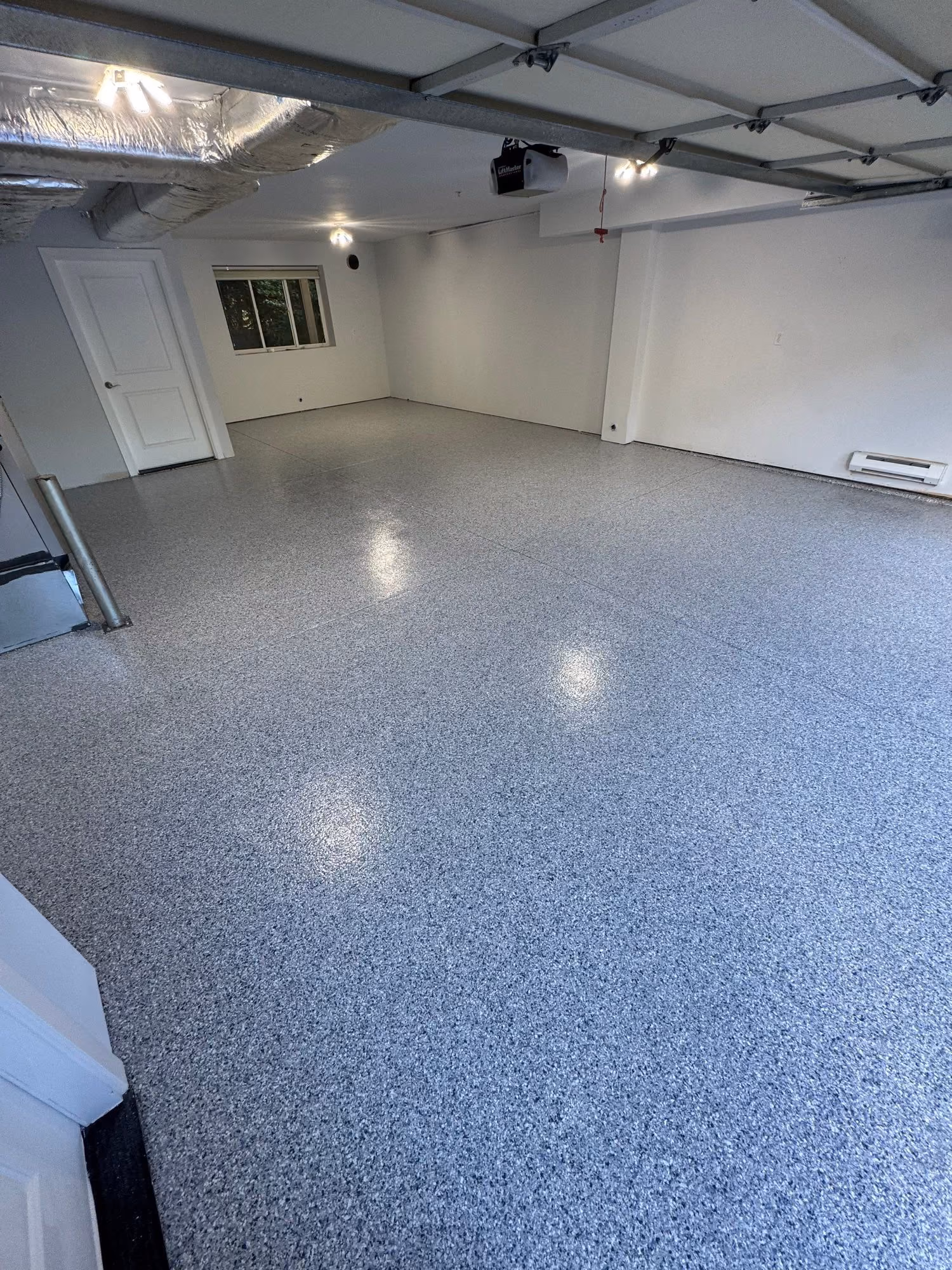 Tidal Wave Evolution epoxy flake floor by Cascade Concrete Coatings