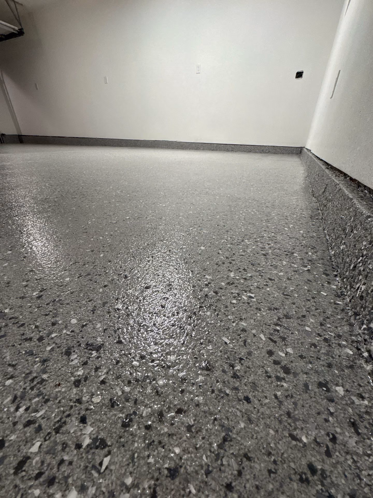 Husky epoxy flake floor by Cascade Concrete Coatings