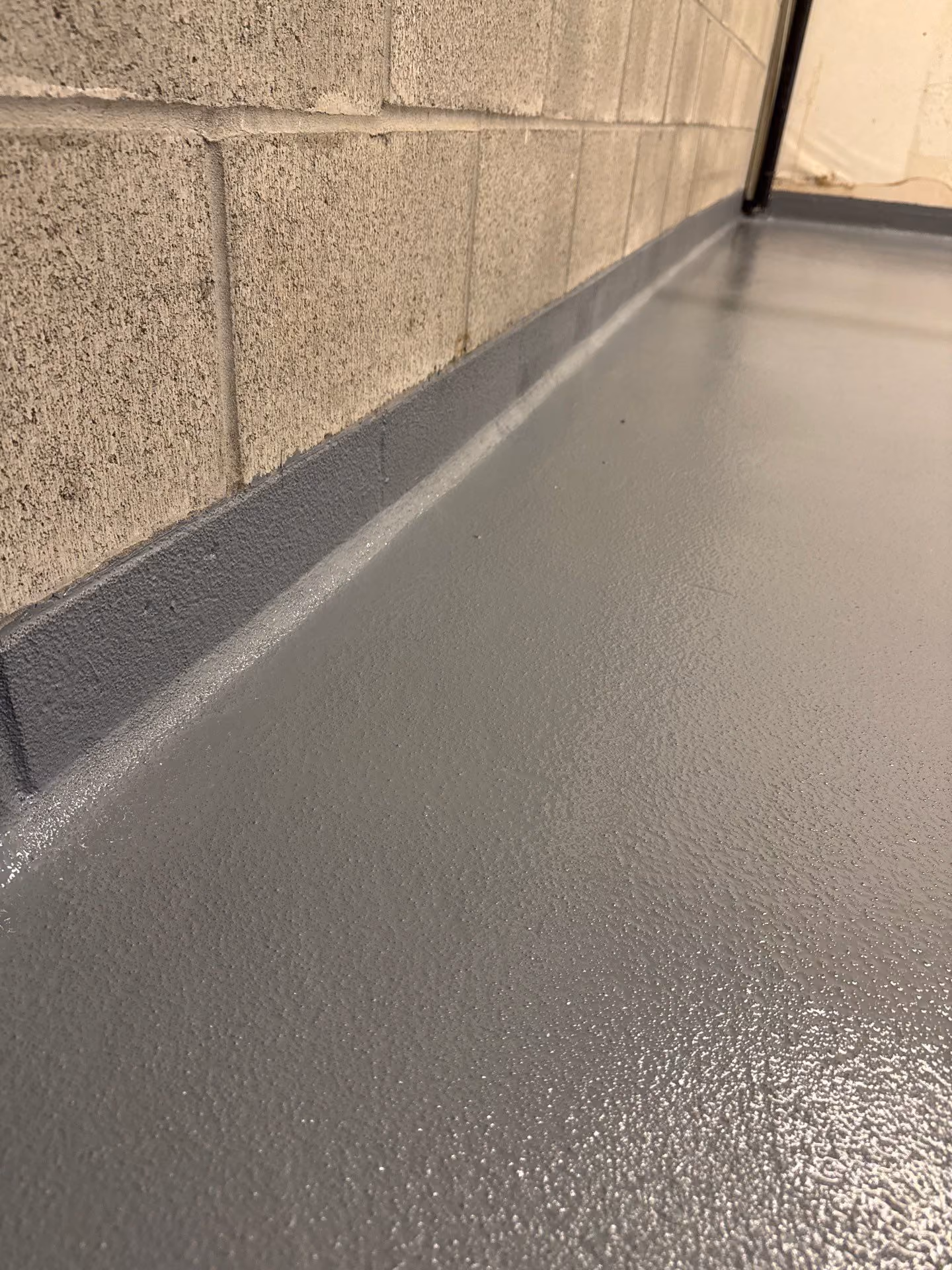 Solid Medium Grey epoxy floor by Cascade Concrete Coatings