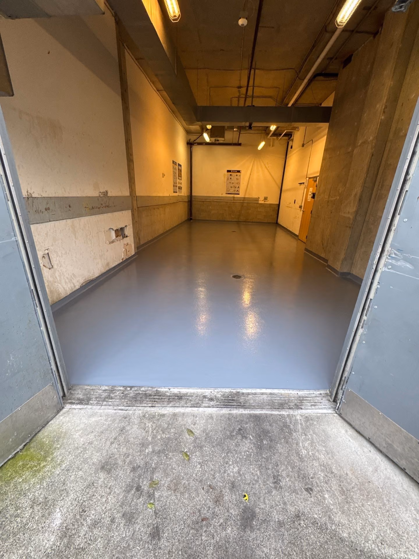 Solid Medium Grey epoxy floor by Cascade Concrete Coatings