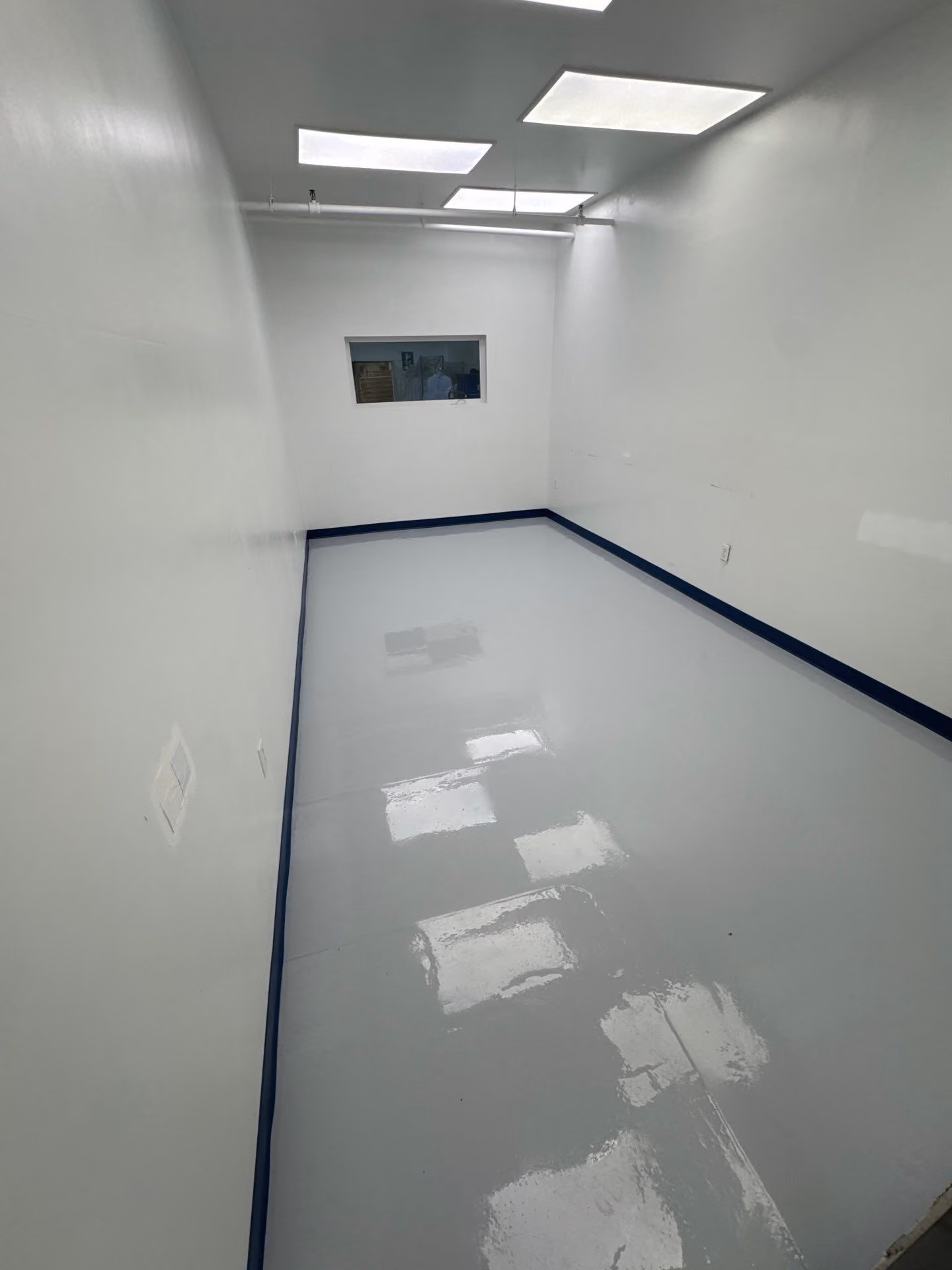 Solid Medium Grey epoxy floor by Cascade Concrete Coatings