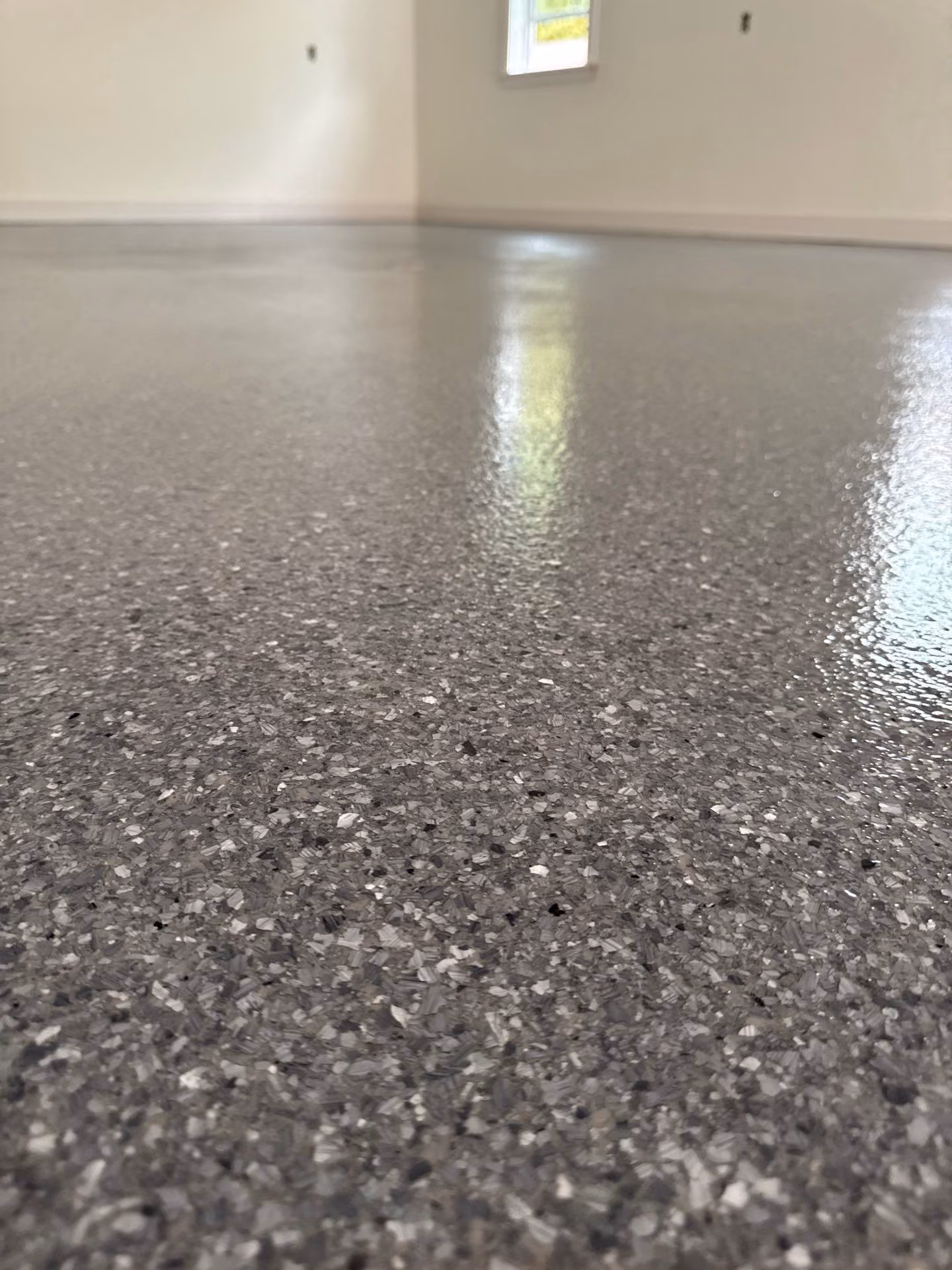Granite Enviroflake epoxy flake floor by Cascade Concrete Coatings