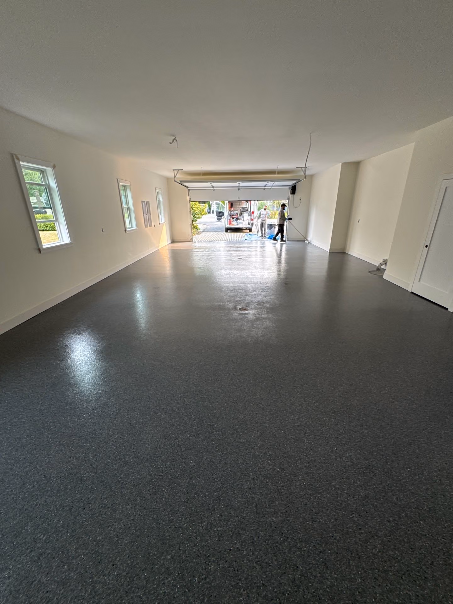 Granite Enviroflake epoxy flake floor by Cascade Concrete Coatings