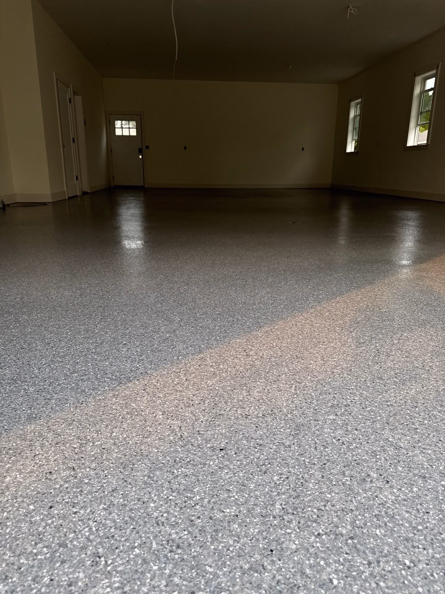 Granite Enviroflake epoxy flake floor by Cascade Concrete Coatings