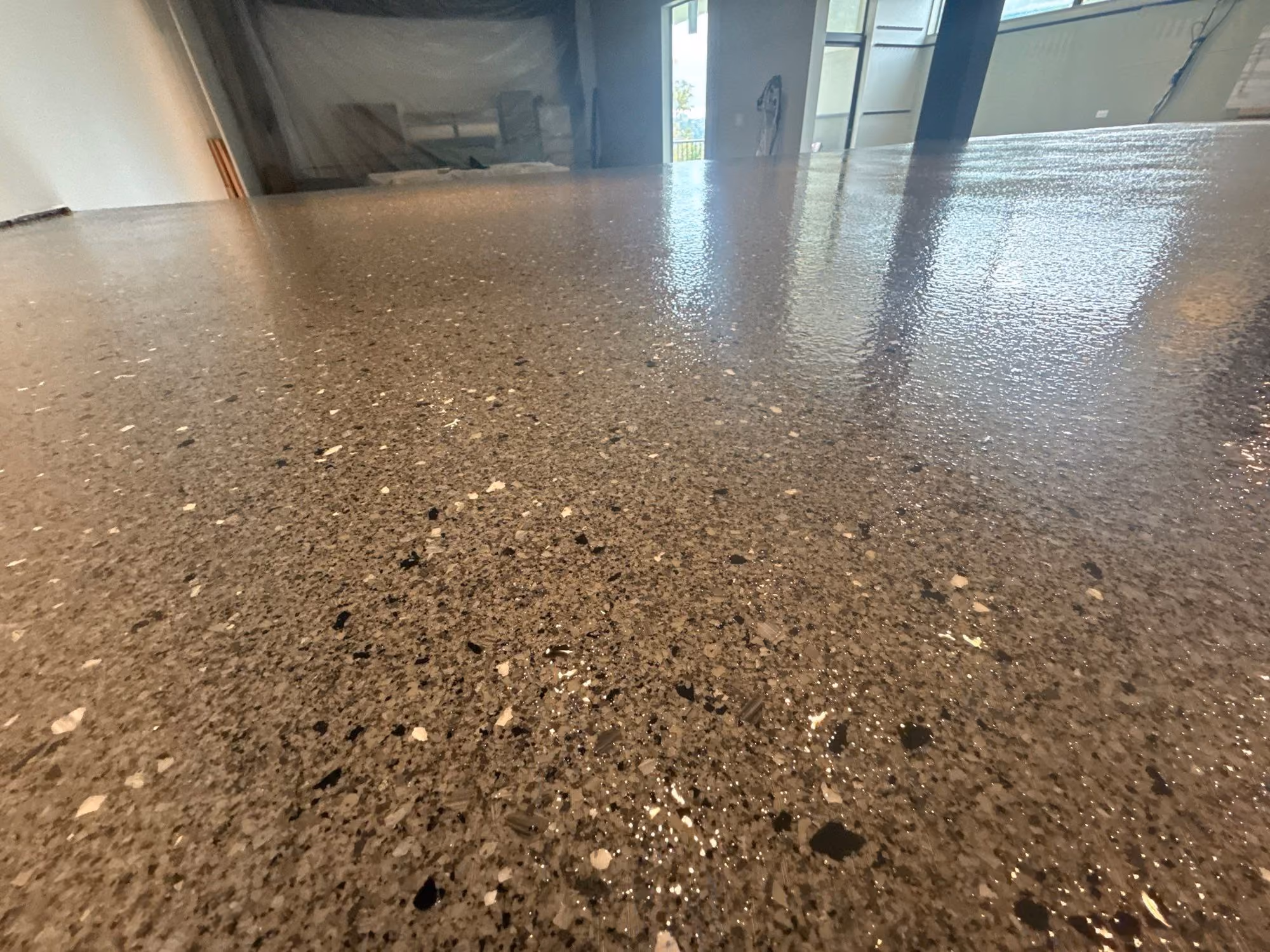 Slate Hybrid Terrazzo epoxy flake floor by Cascade Concrete Coatings