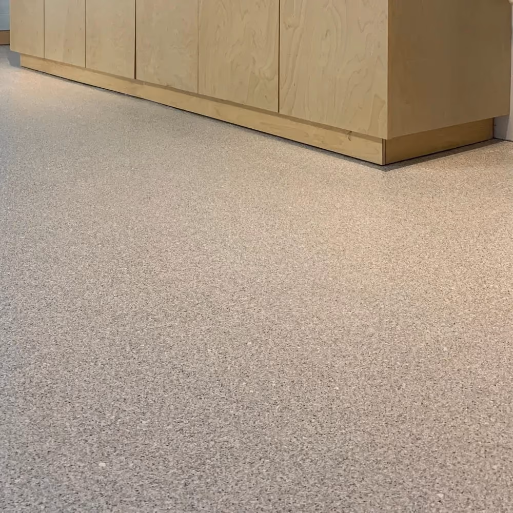 Limestone hybrid terrazzo floor coating in a garage