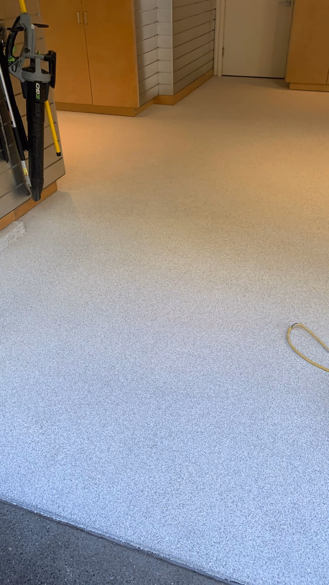Limestone Hybrid Terrazzo epoxy flake floor by Cascade Concrete Coatings
