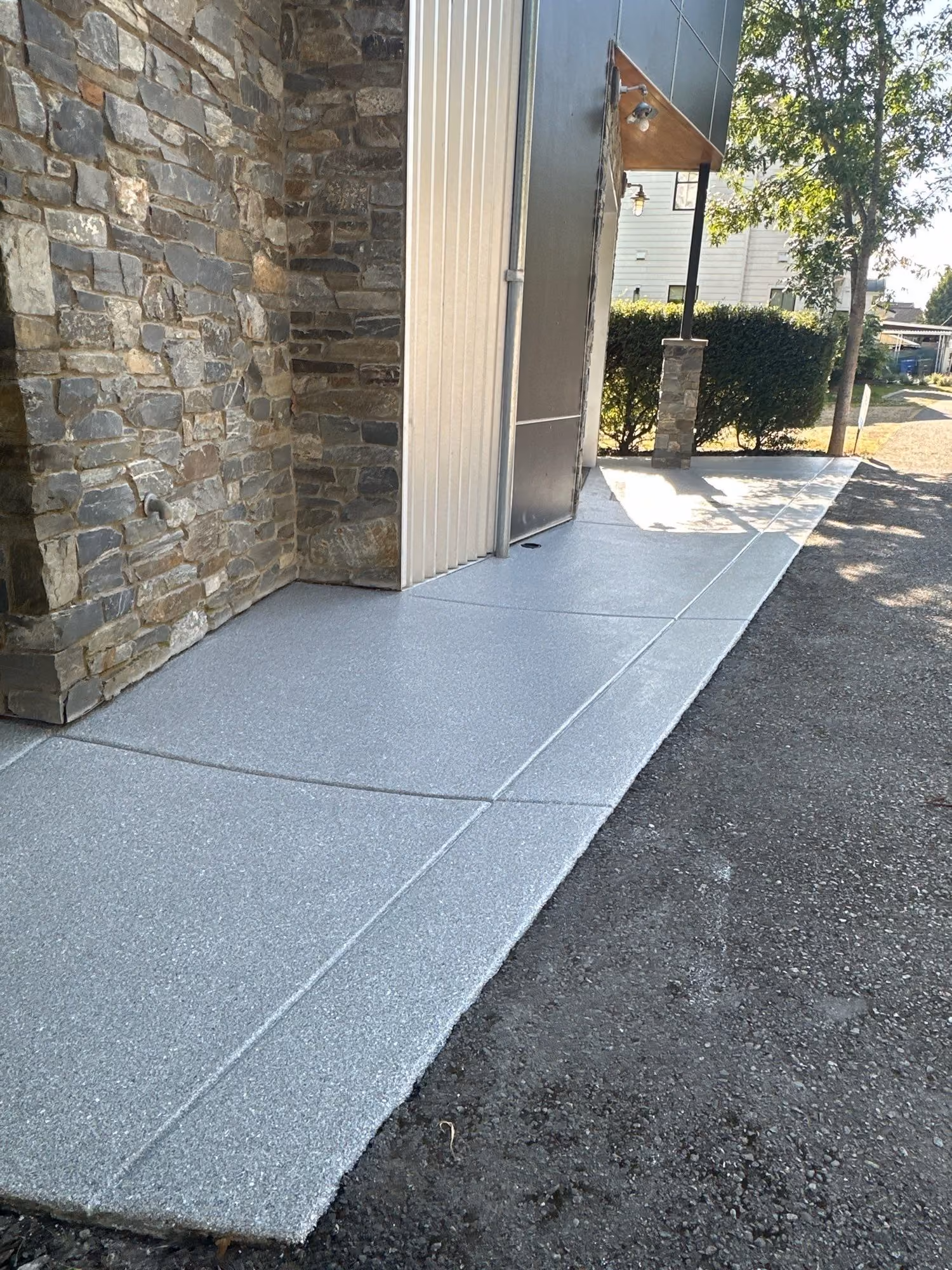 Blue Granite Hybrid Terrazzo epoxy flake floor by Cascade Concrete Coatings
