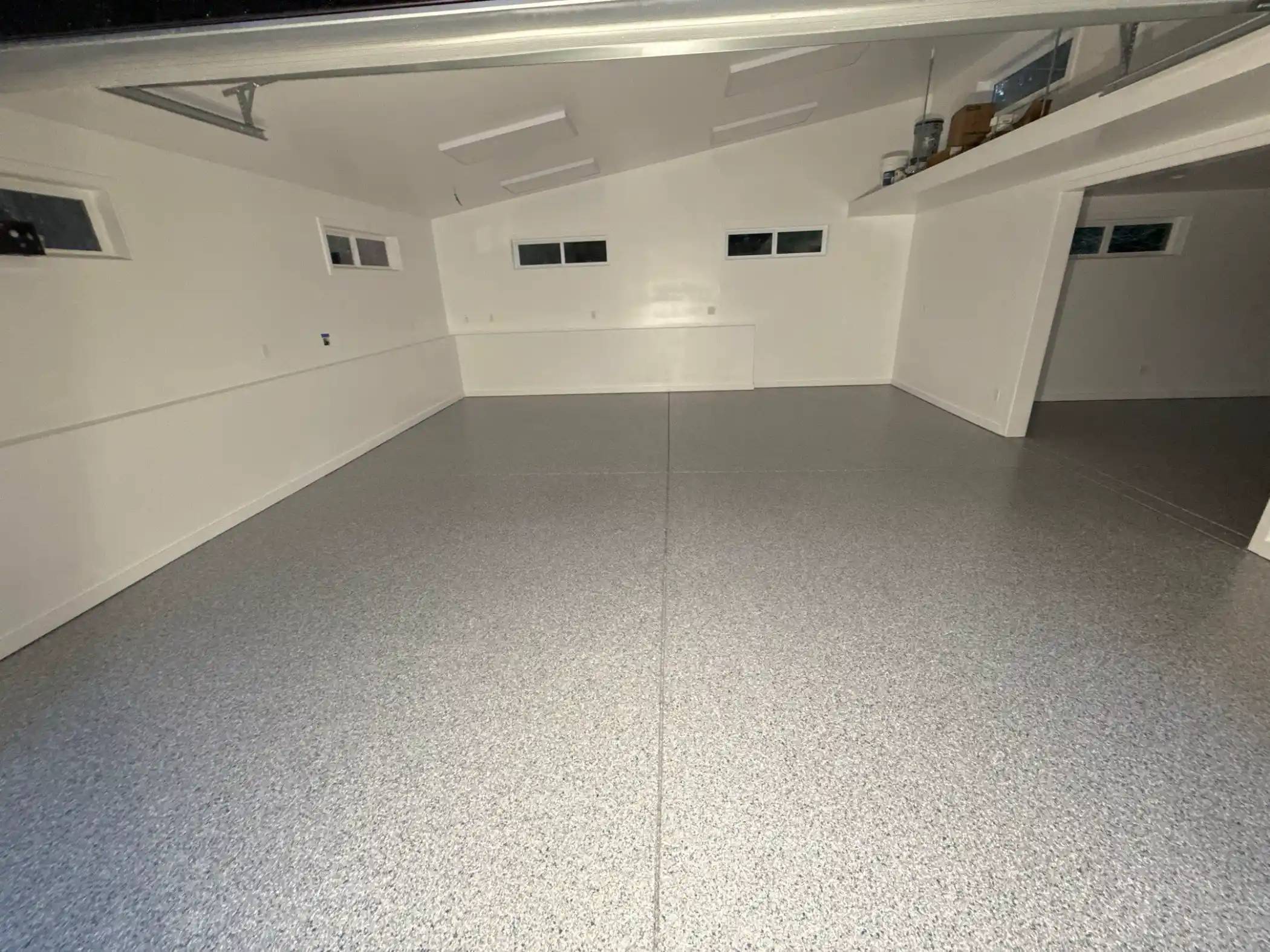 Long garage bay with Tidal Wave flake and clerestory windows in Woodinville