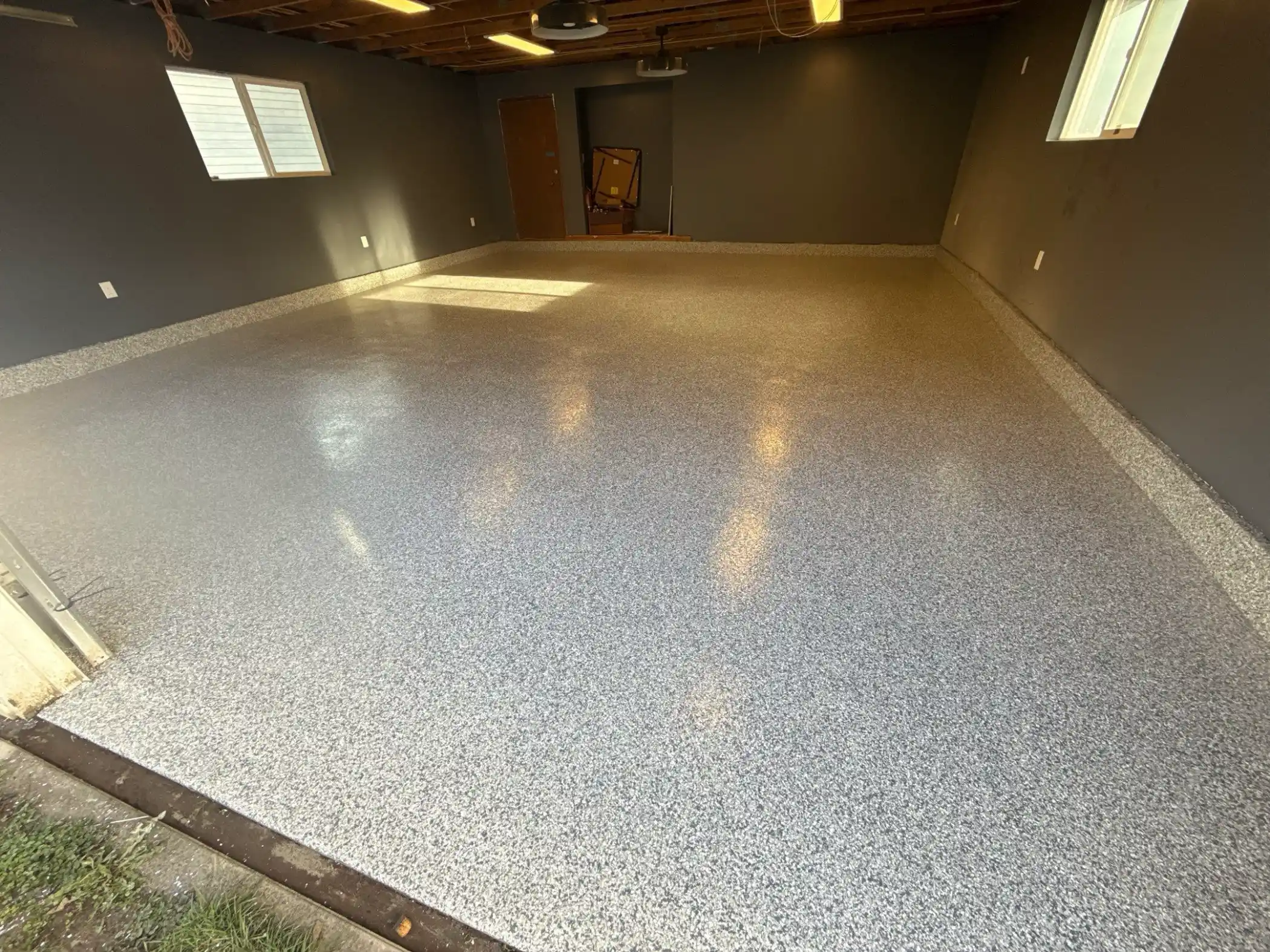 Slate Stone flake polyurea garage floor with dark grey walls on Camano Island