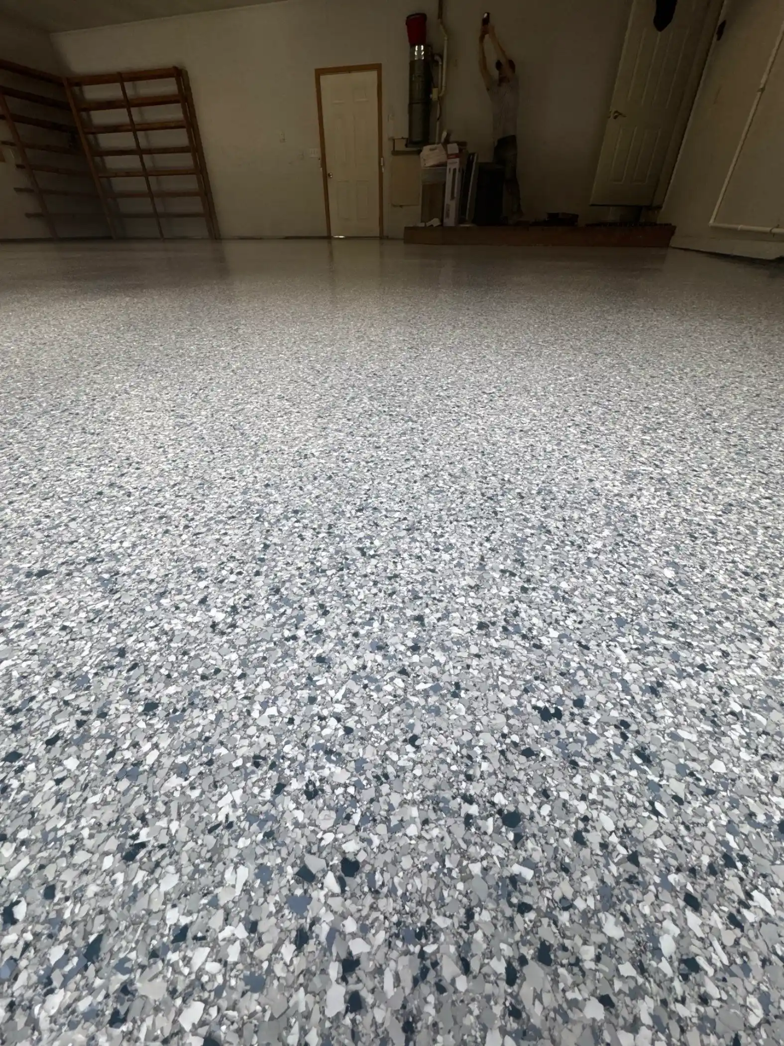 Finished Tidal Wave polyurea floor toward the back door of a Fox Island garage