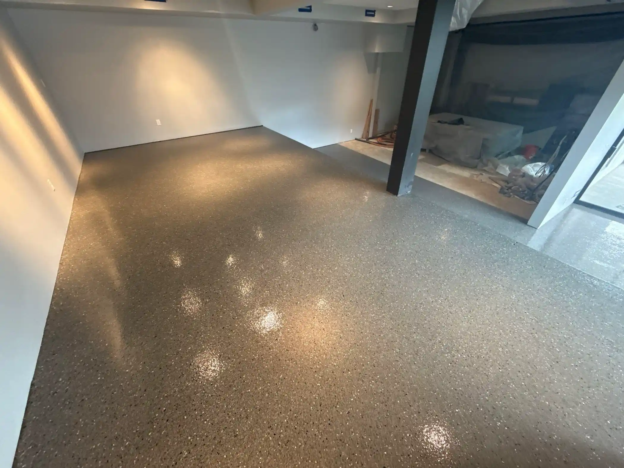 Glossy Slate terrazzo flake floor on the lower level of a Seattle home