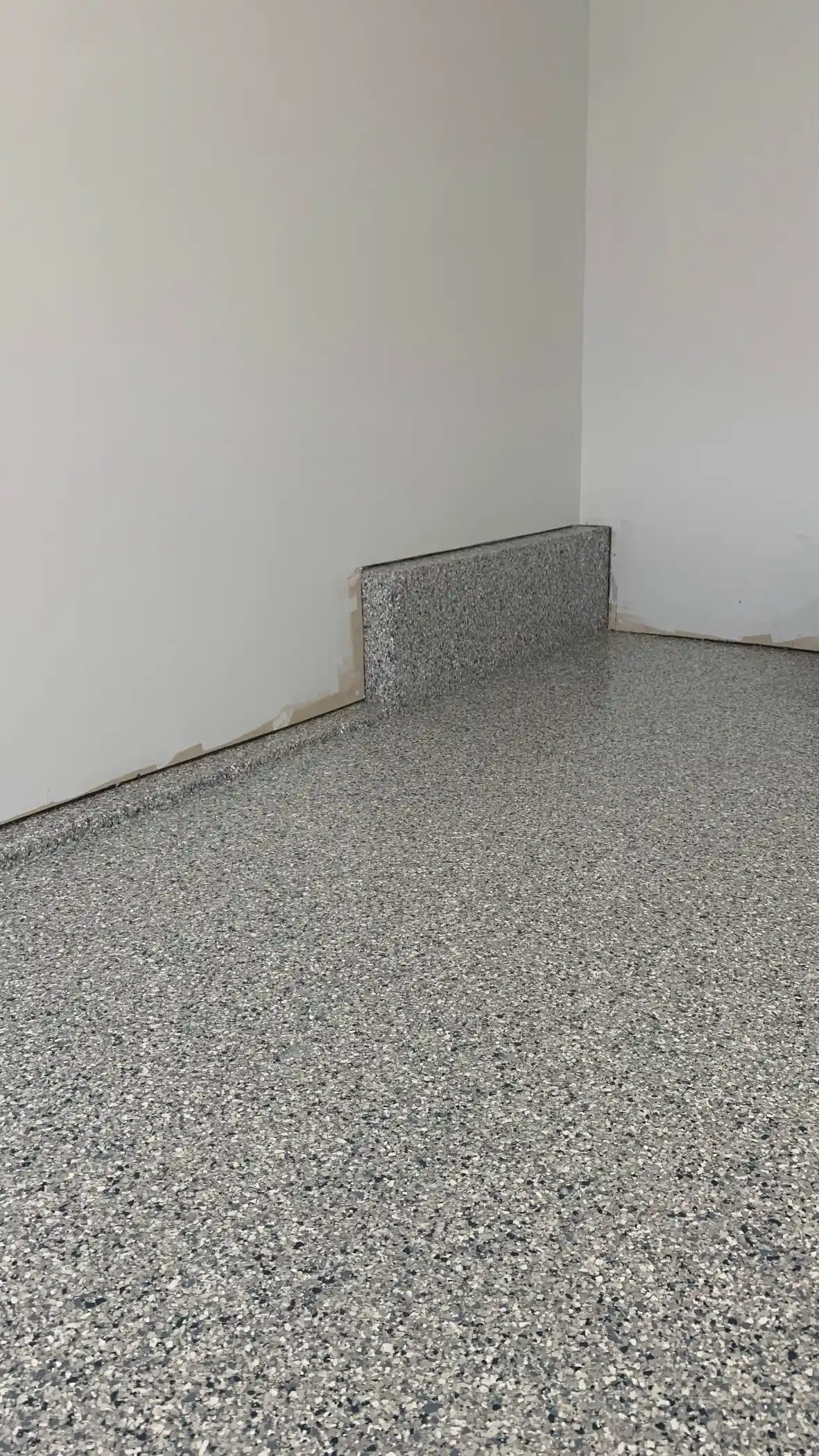 Coated concrete knee wall and Tidal Wave flake floor in a Sammamish garage