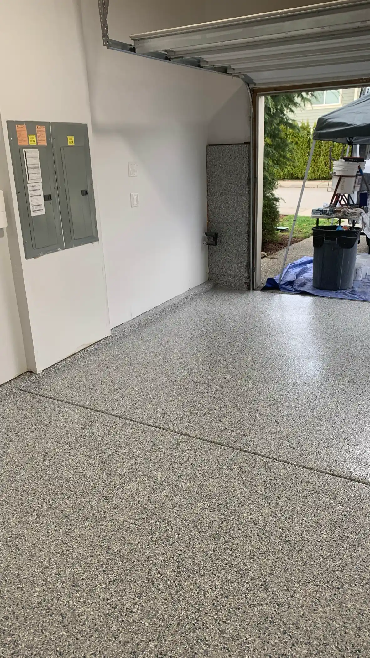 Tidal Wave flake garage floor by the electrical panel in a Sammamish home