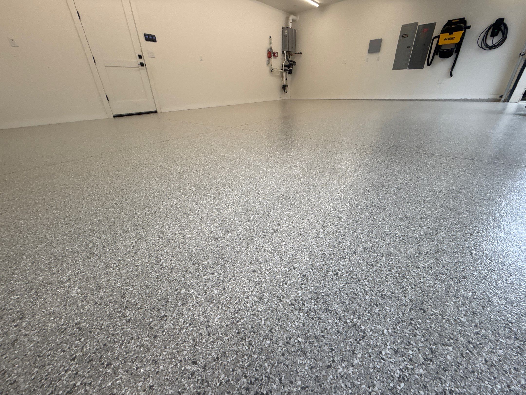 Mount Everest flake polyurea garage floor in a bright Mercer Island home