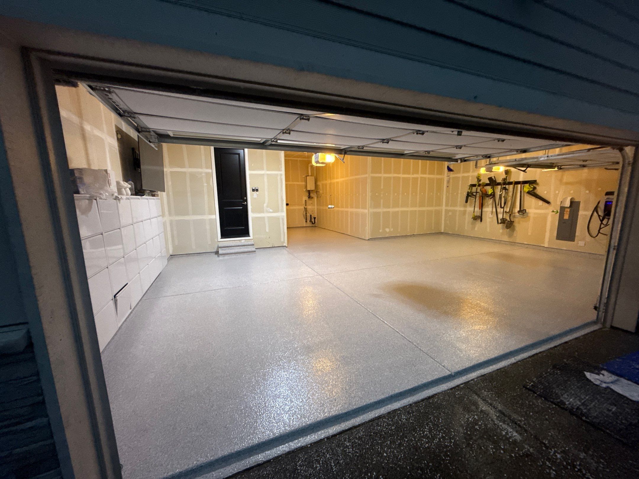 Ash Enviroflake polyurea floor seen through the open door of a Lake Stevens garage