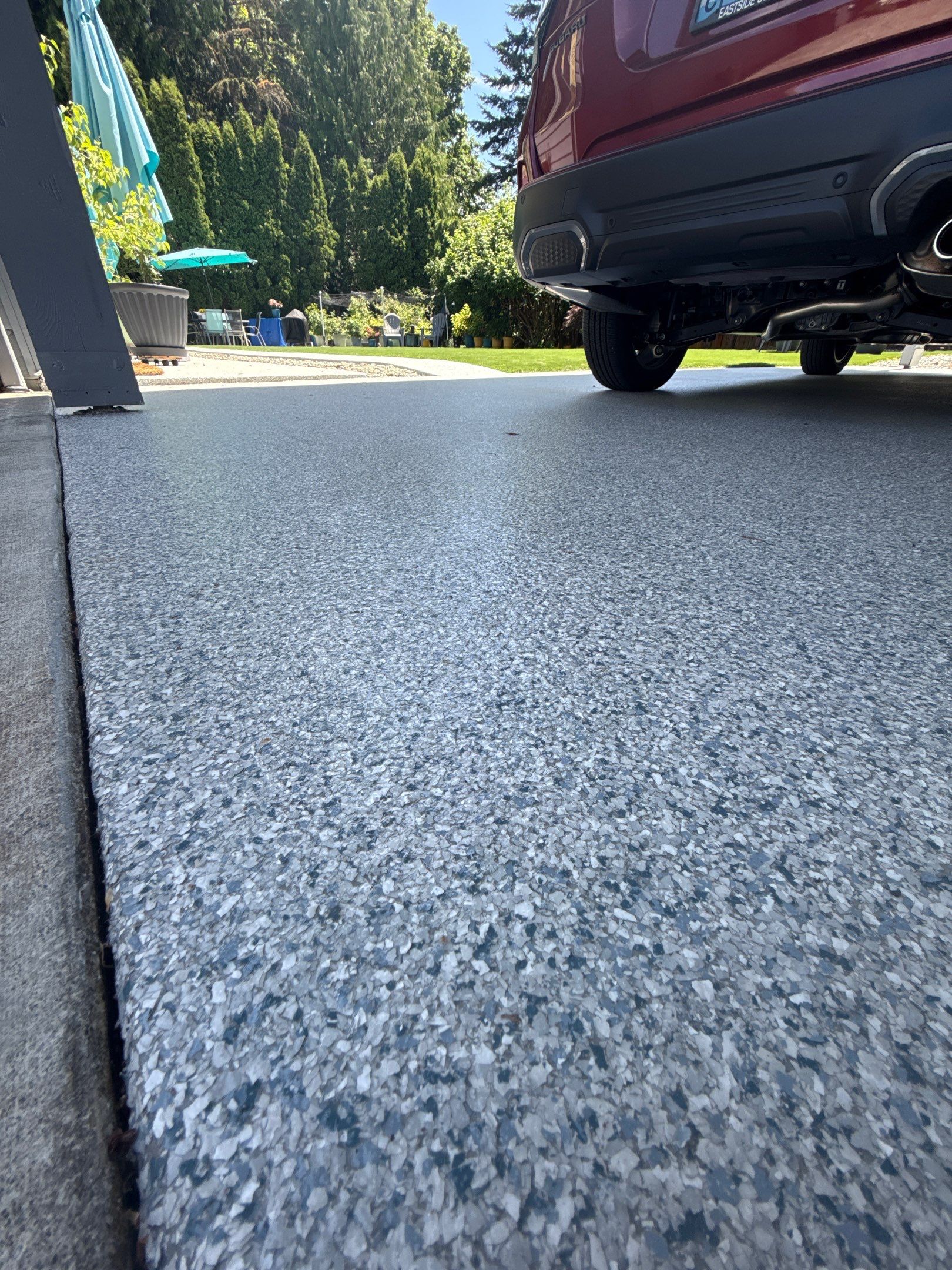Close view of Tidal Wave flake on the covered parking pad of a Bothell home