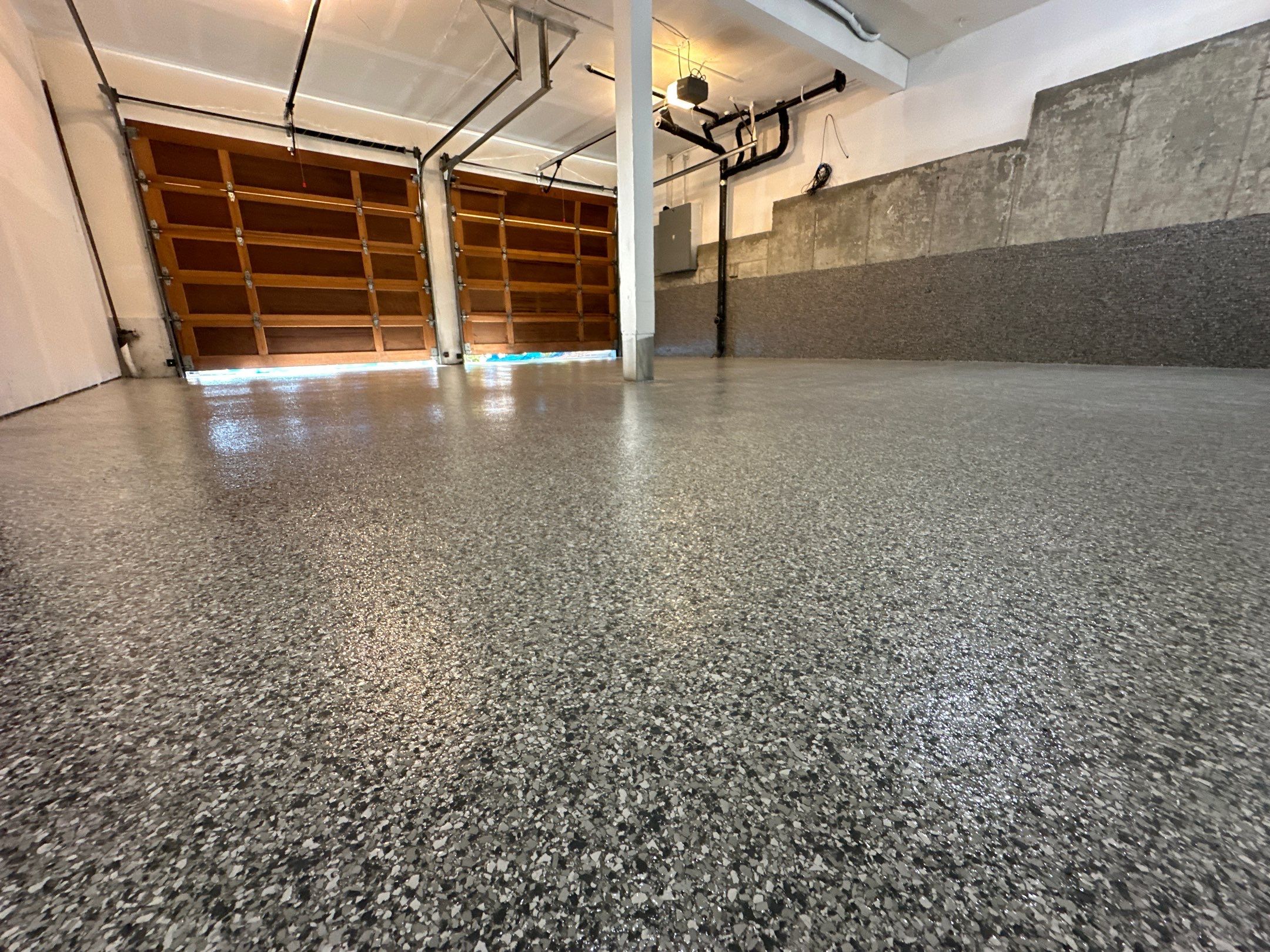 Silver Creek and Slate Stone flake garage floor with wood garage doors in Shoreline