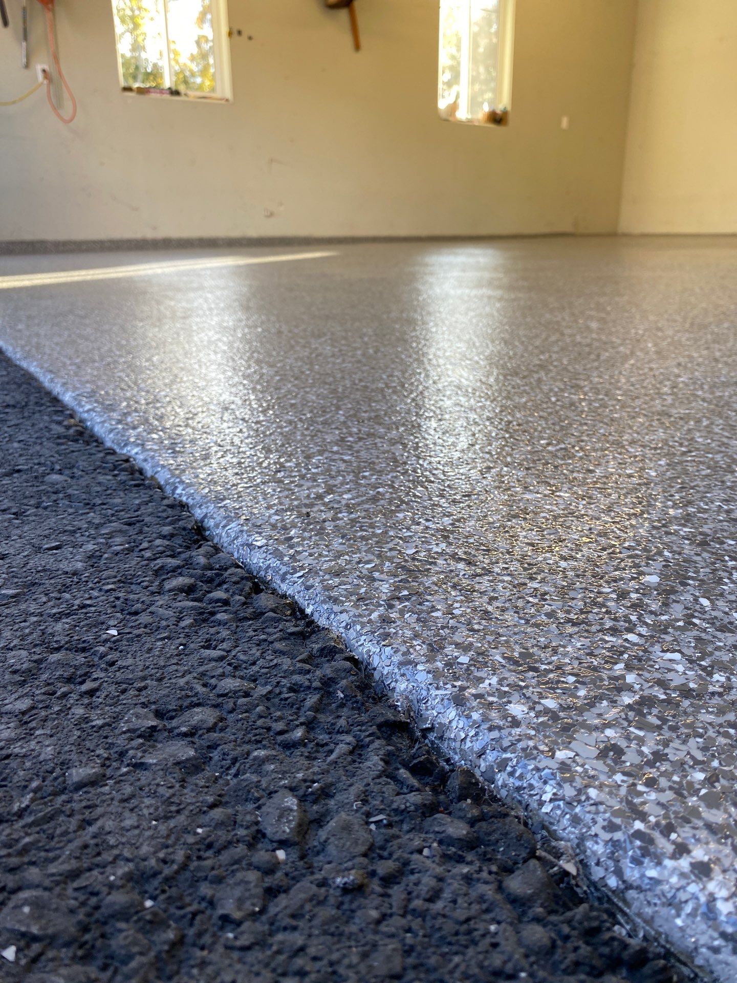 Glossy Silver Creek polyurea floor in a two-car Cle Elum garage
