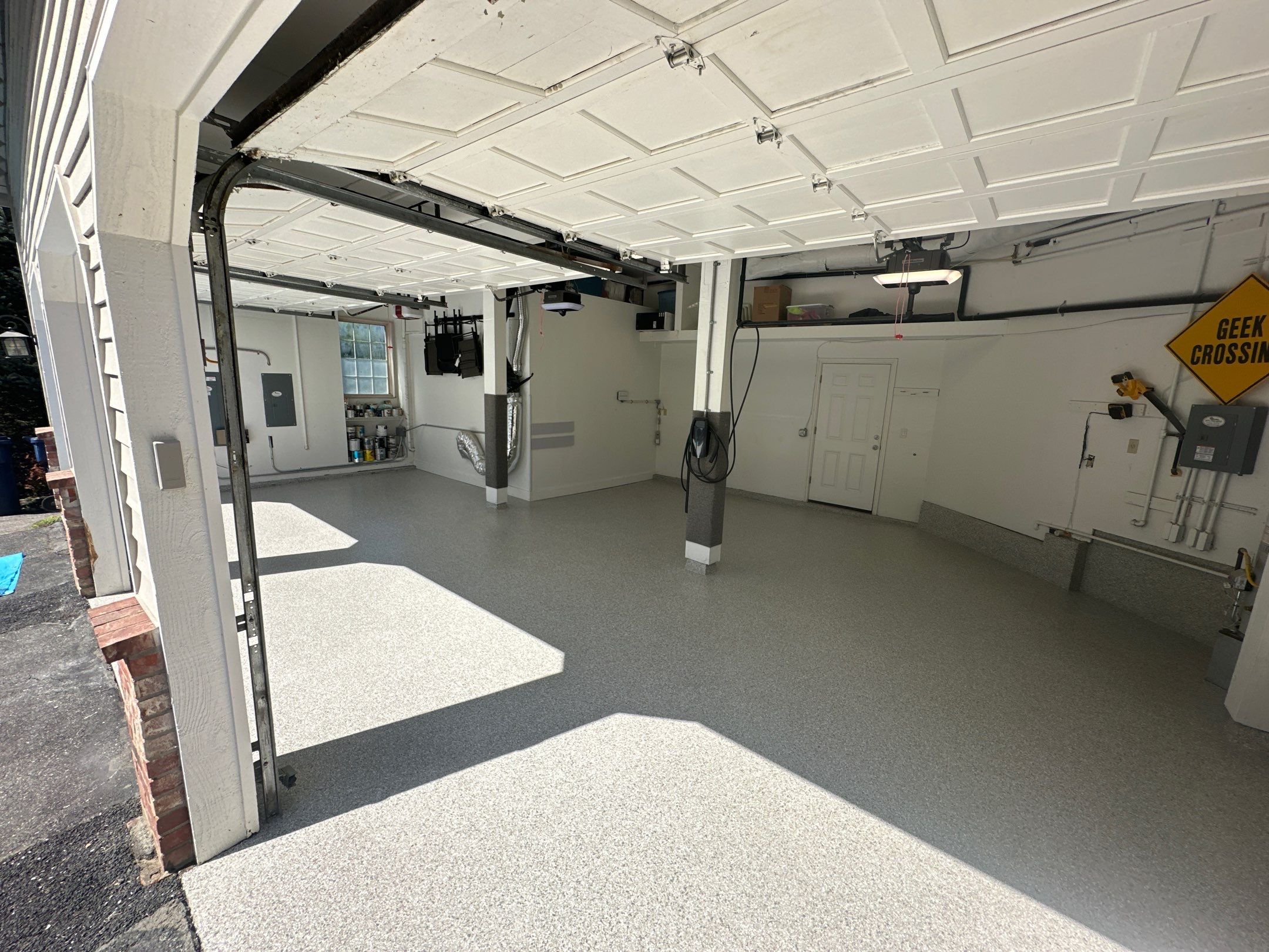 Mount Everest flake garage floor seen from the open door of a Woodinville home