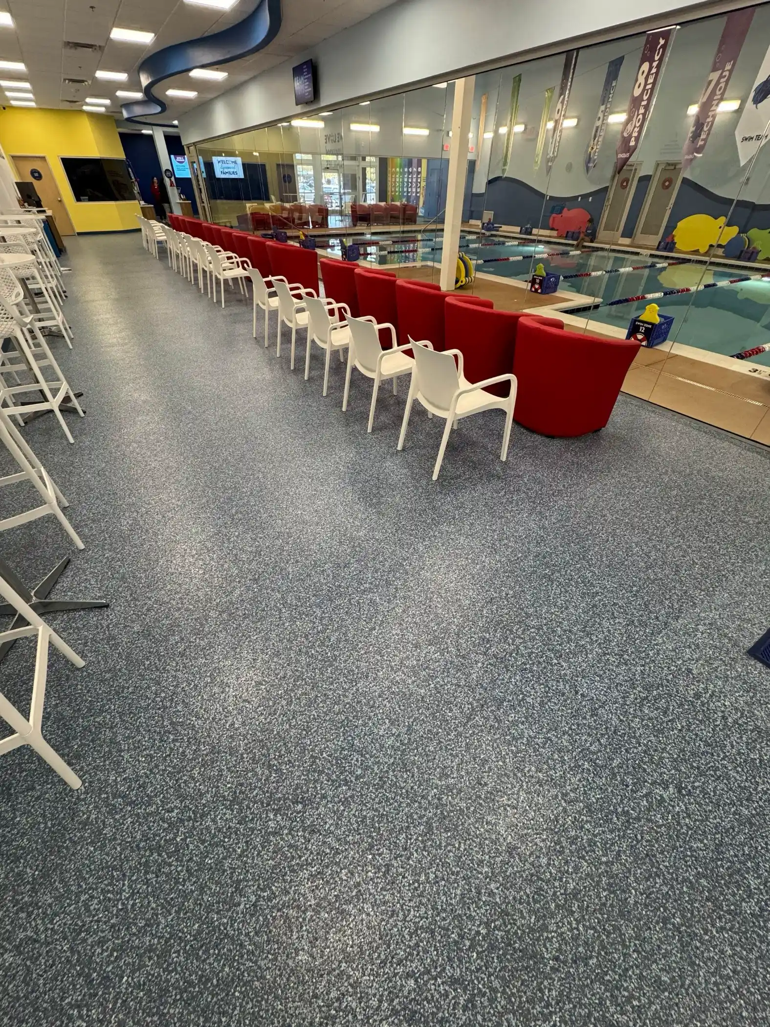 Blue flake polyurea floor in the pool viewing lobby of a Lynnwood swim school