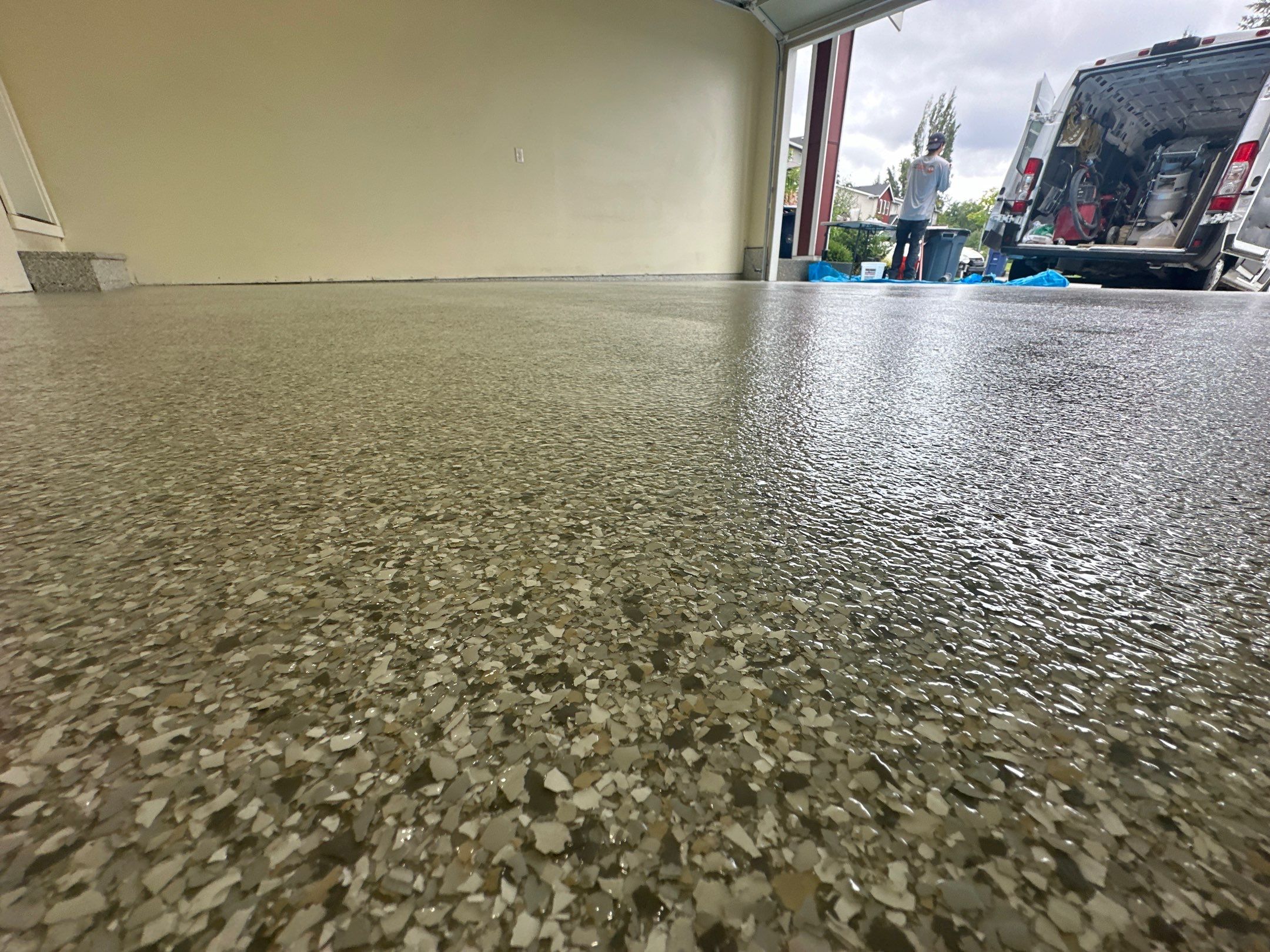 Low close view of Mount Everest flake with the crew truck outside a Bothell garage