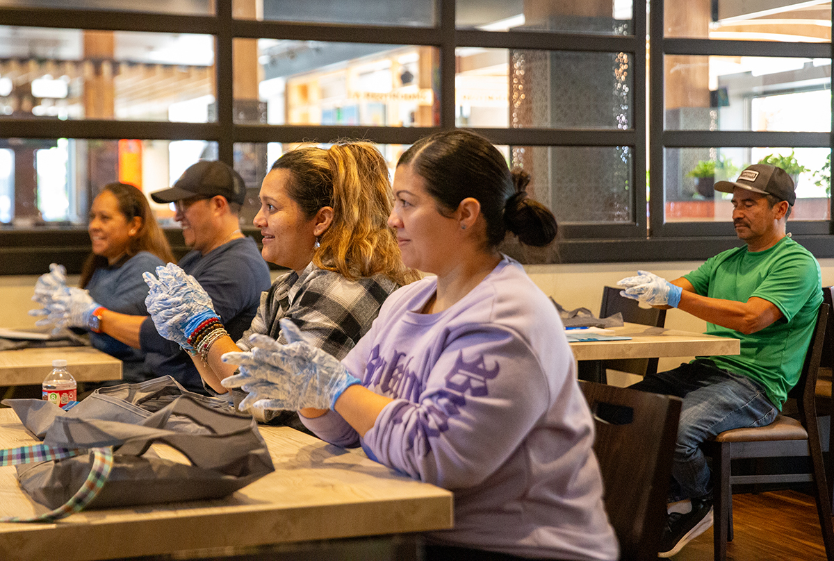 Hospitality staff working safely in commercial kitchen and dining room: Colorado restaurant workers receive Spanish-language safety training
