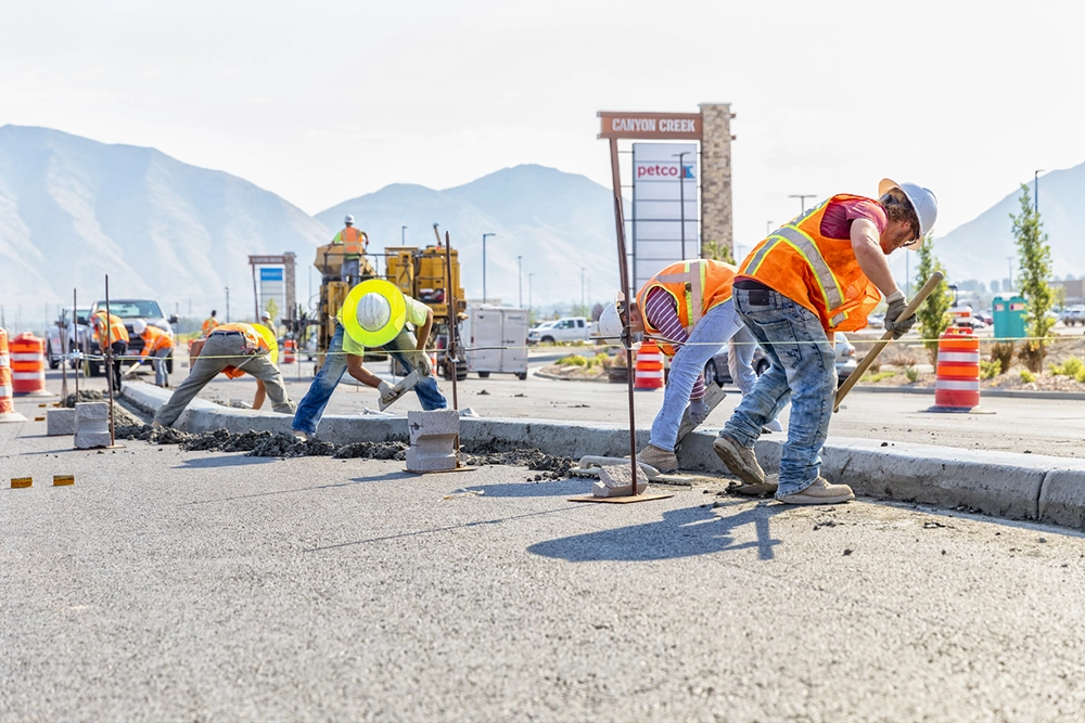 Outdoor workers staying hydrated and taking shaded breaks in Colorado summer heat