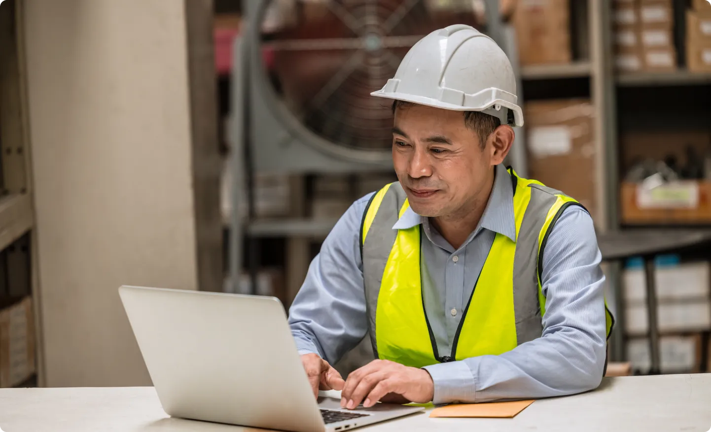 Warehouse manager viewing and managing all activities within a warehouse using a WMS-enabled control tower.