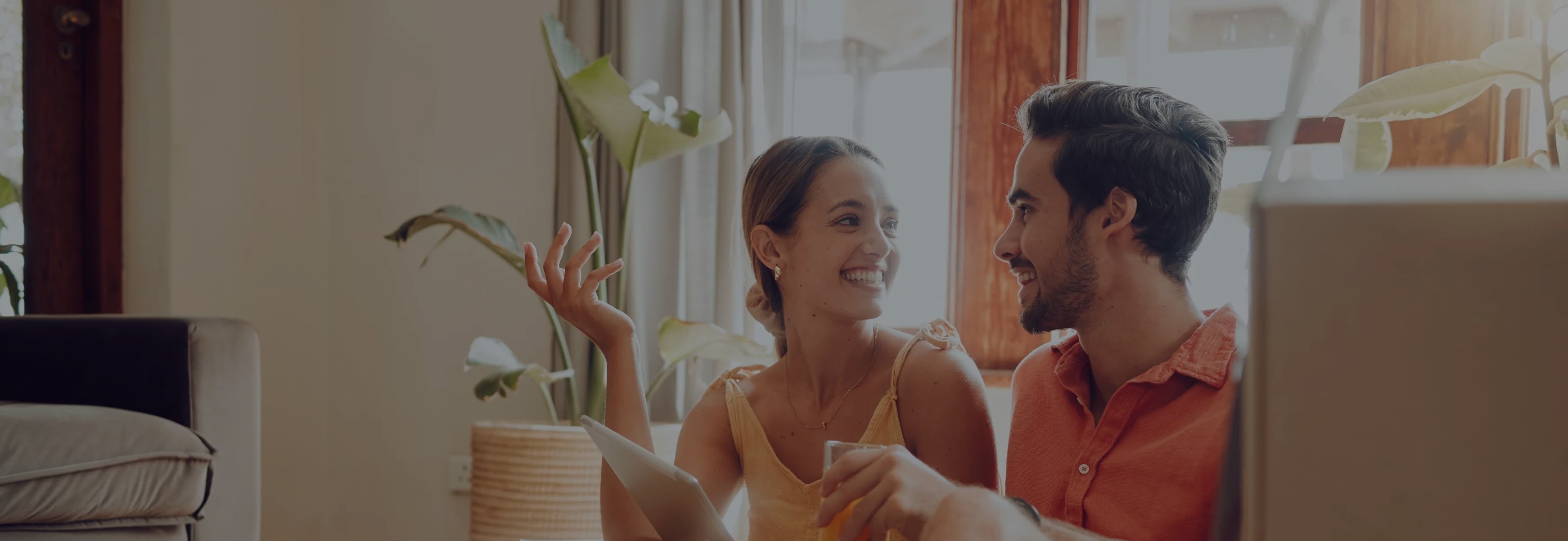 Collage of smiling couples talking, laughing, and embracing at home