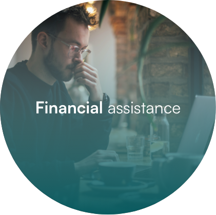 Professional working on financial planning at desk with laptop