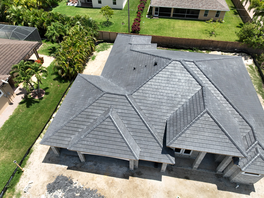 Final roof installation at Palmetto Pinte Cape Coral home.