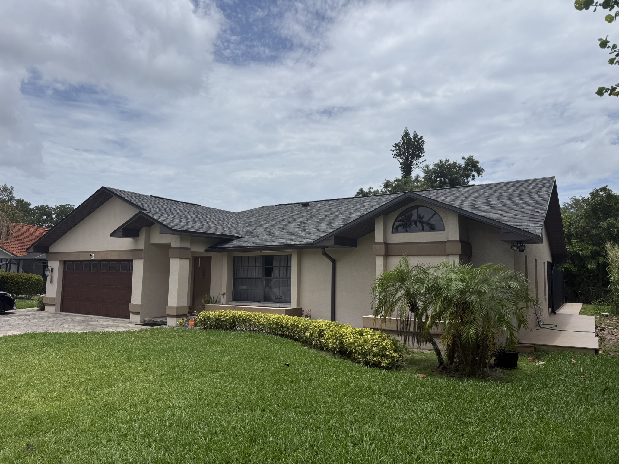 Final roof shot of shingle roof replacement in Banyan Cove, Fort Myers