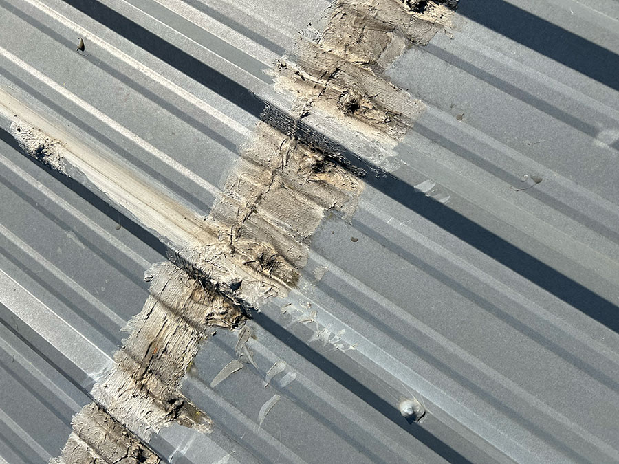 Replace Damaged Roof Panels: approximately 120 Lineal Feet with PBR Galvalume 36" panels with 12" center ribs.