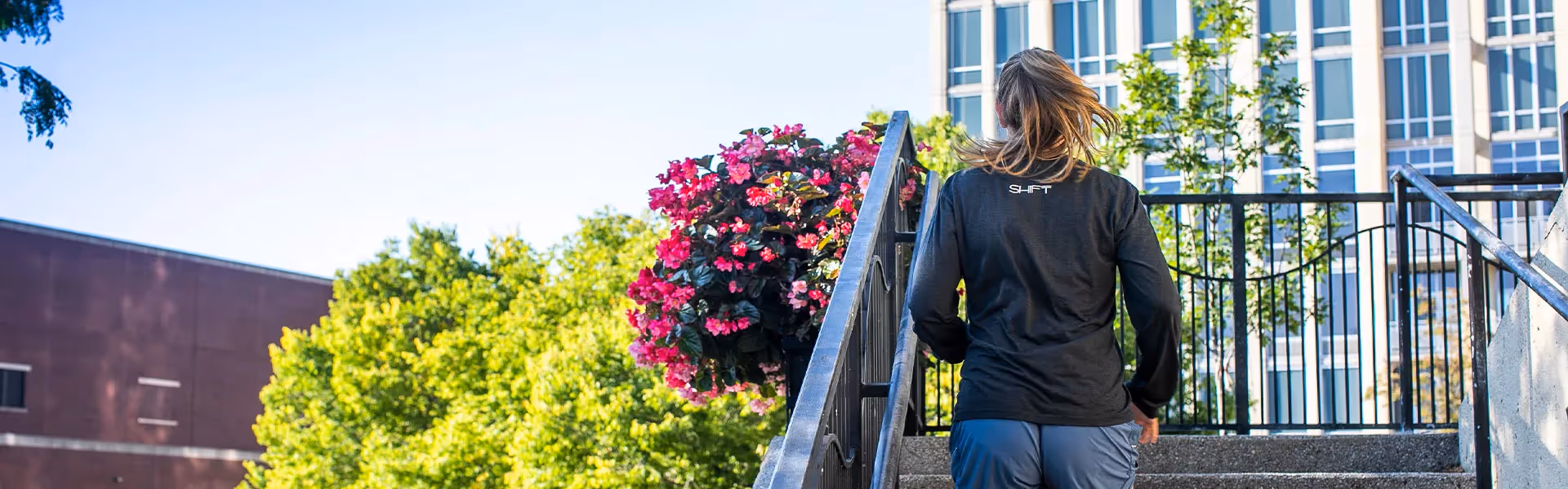 Woman jogging runs up the stairs in Chicago, IL