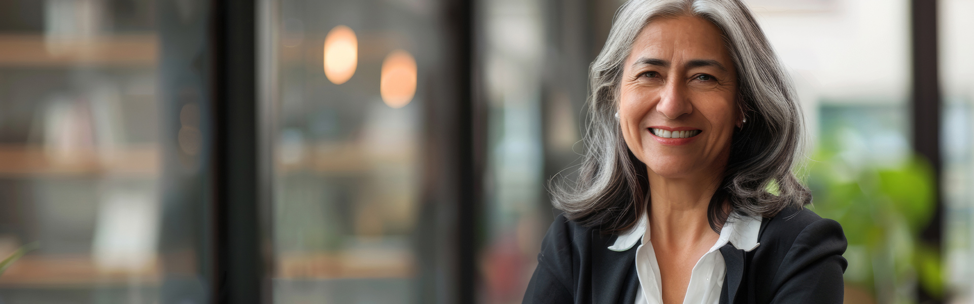 Menopause age woman smiling after receiving treatment from the best concierge doctors in Chicago, IL