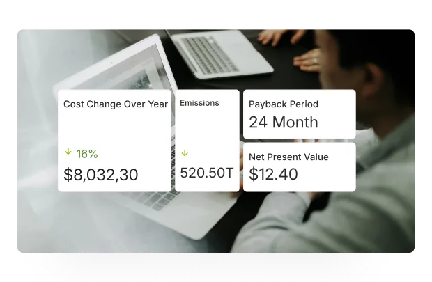 Man working on a laptop with an overlay showing financial data: 16% decrease in cost change over year, $8,032.30, 520.50T emissions, 24-month payback period, and $12.40 net present value.