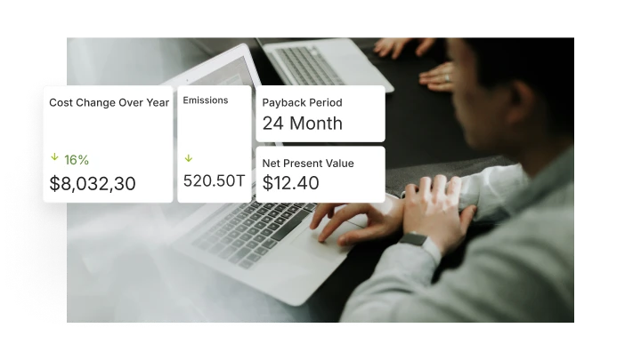 Man working on a laptop with an overlay showing financial data: 16% decrease in cost change over year, $8,032.30, 520.50T emissions, 24-month payback period, and $12.40 net present value.