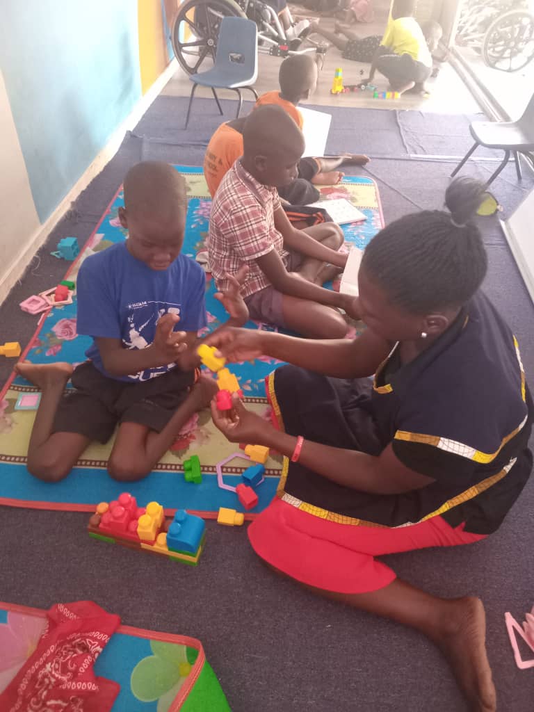 At Musana Nursery and Primary School, our Special Needs Unit supports 21 children living with disabilities such as autism and cerebral palsy by providing specialized therapy and learning services.