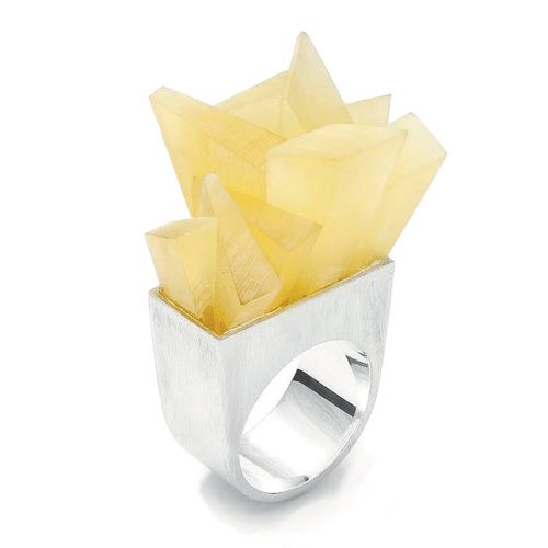 Ring with irregular, bright amber