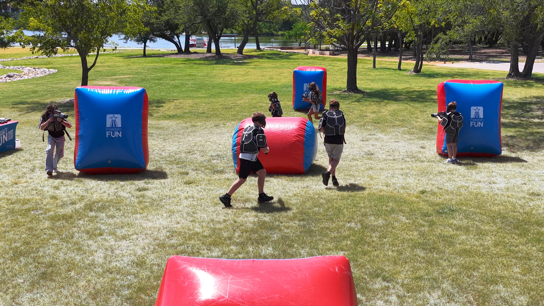 Players competing in an outdoor Gel Blaster Nexus event