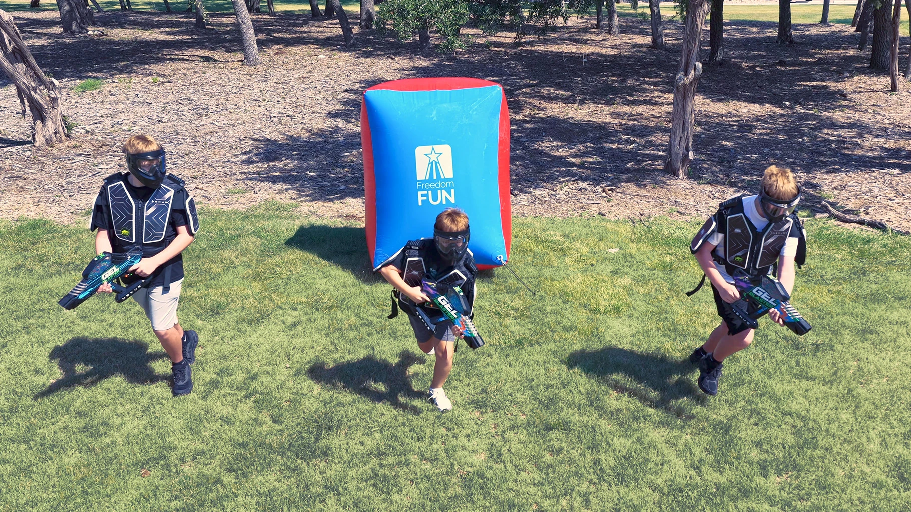 Young players enjoying a connected Gel Blaster event