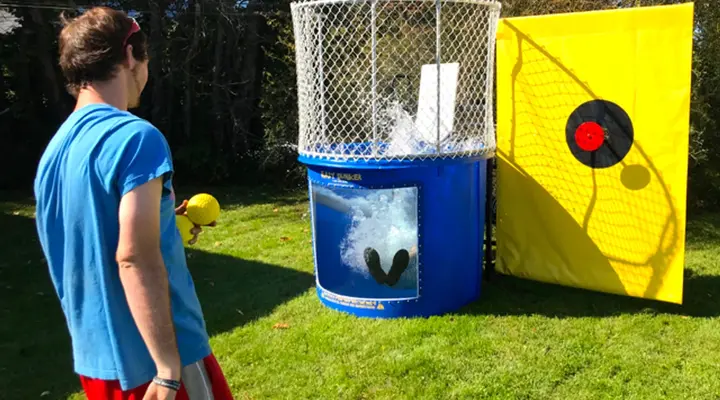 Dunk tank rental setup at an outdoor event.