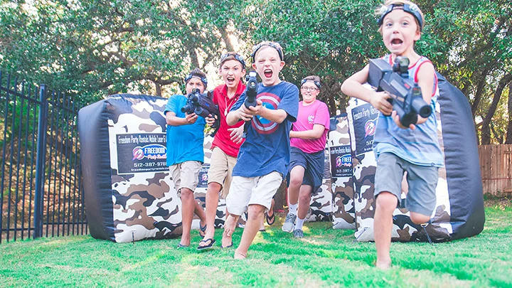 Laser tag rental in the backyard for a laser tag birthday party. Our mobile laser tag rental packages are great for team builders, birthdays, school events & more.
