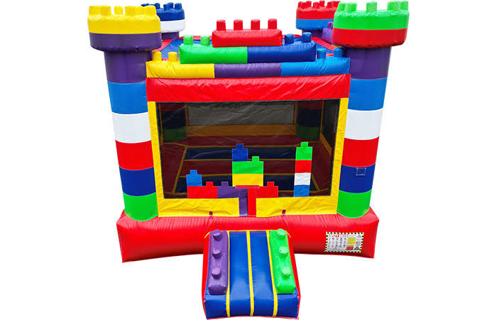 Front view of our vibrant brick-themed bounce house rental, featuring giant building blocks—available in Waco, Temple, and Killeen TX from Freedom Fun USA.