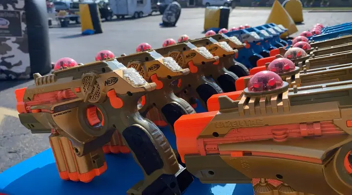 Coaches getting ready for a nerf laser tag rental birthday party. Our mobile laser tag equipment rental packages are great for team builders, birthdays, school events & more.